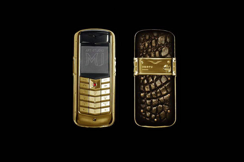 VERTU CONSTELLATION GOLD EXOTIC LEATHER COFFEE CHOCOLATE LIMITED EDITION by MJ Gold Phone. Genuine Leather Crocodile Black Chocolate. Inlaid Blood Ruby.