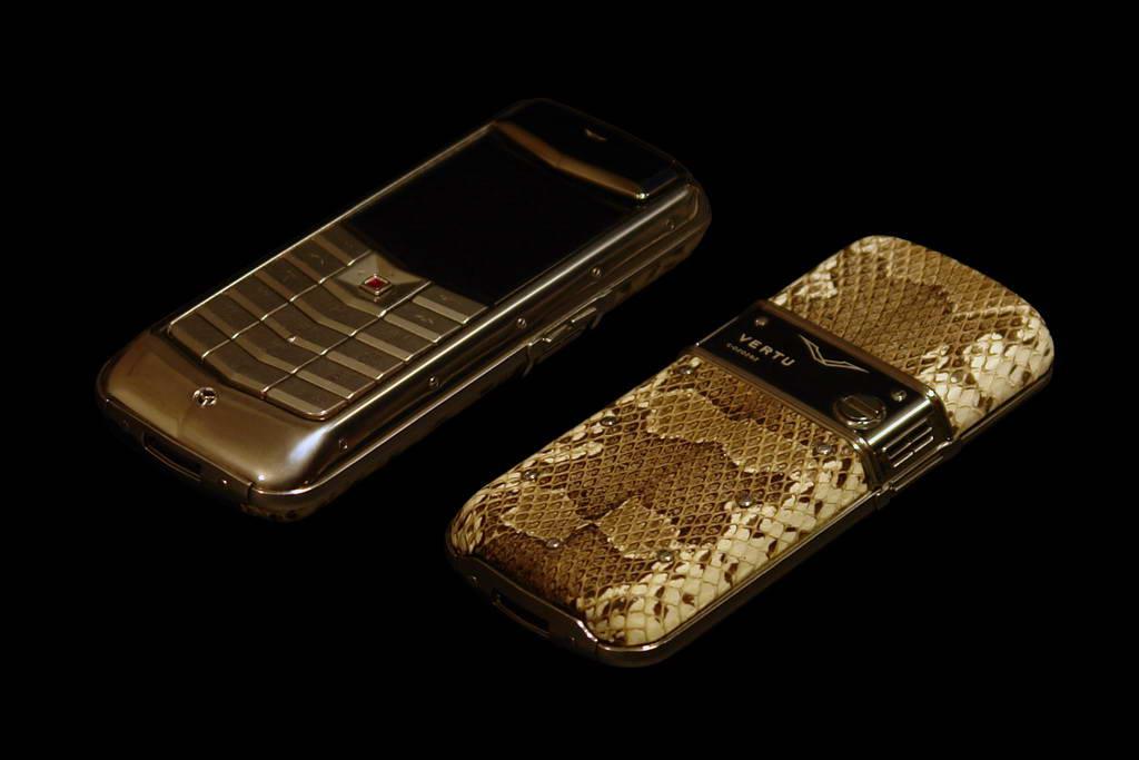 VERTU CONSTELLATION EXOTIC LEATHER LIMITED EDITION by MJ Mobile Phone from Gold 777. Genuine Leather Python Handcraft. Inlaid Pink Diamond